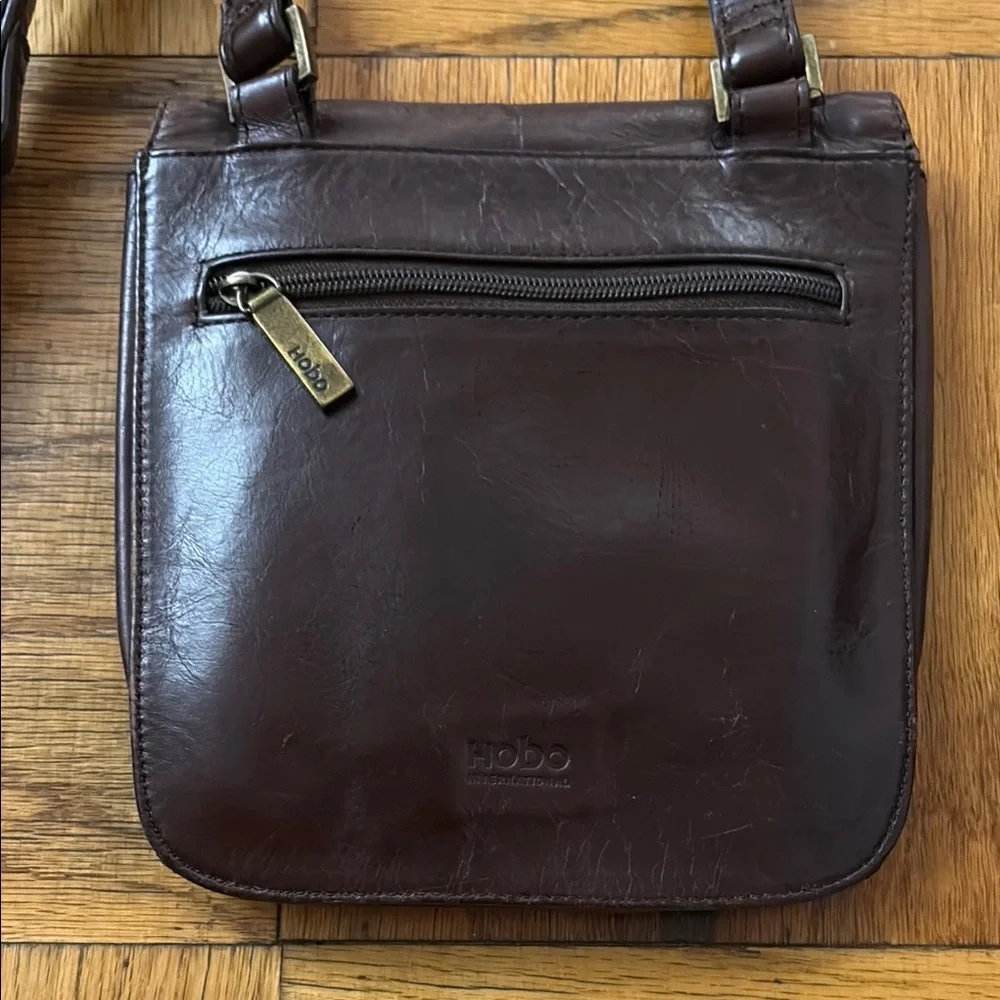 HOBO Brown Leather Messenger Bag with Minimalist Flap Design